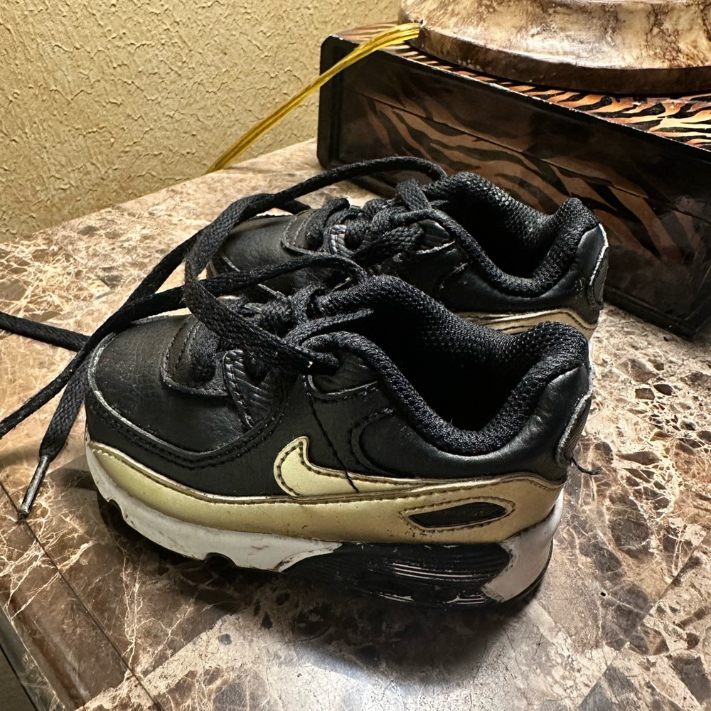 Nike Kids Black and Gold Sneakers